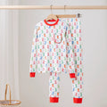 White two-piece pajamas with colorful cowboy boots and stars, a chest pocket, and red neckline, wrist cuffs and ankle cuffs.